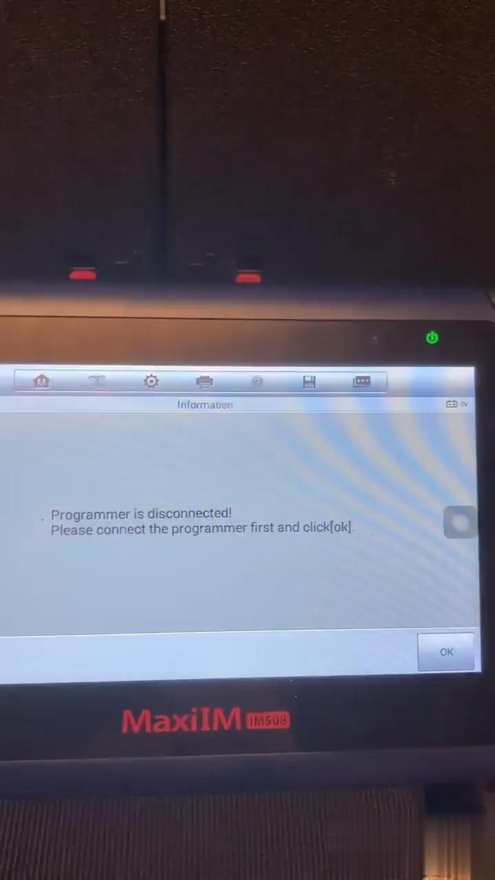 "Programmer is disconnected! Please connect the programmer first and click [OK].", tap "Ok".